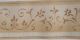 PAPER EDGE WITH EMBOSSED-EFFECT BROWN WAVES